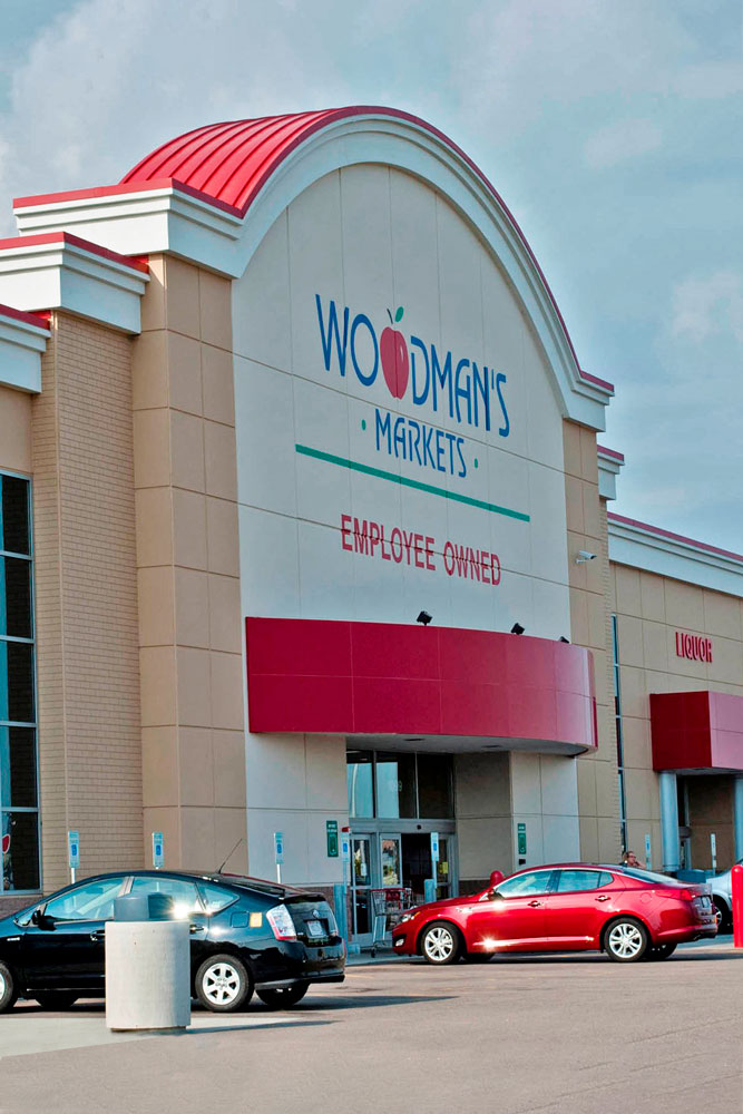 Woodman's entrance with metal roof & paneling